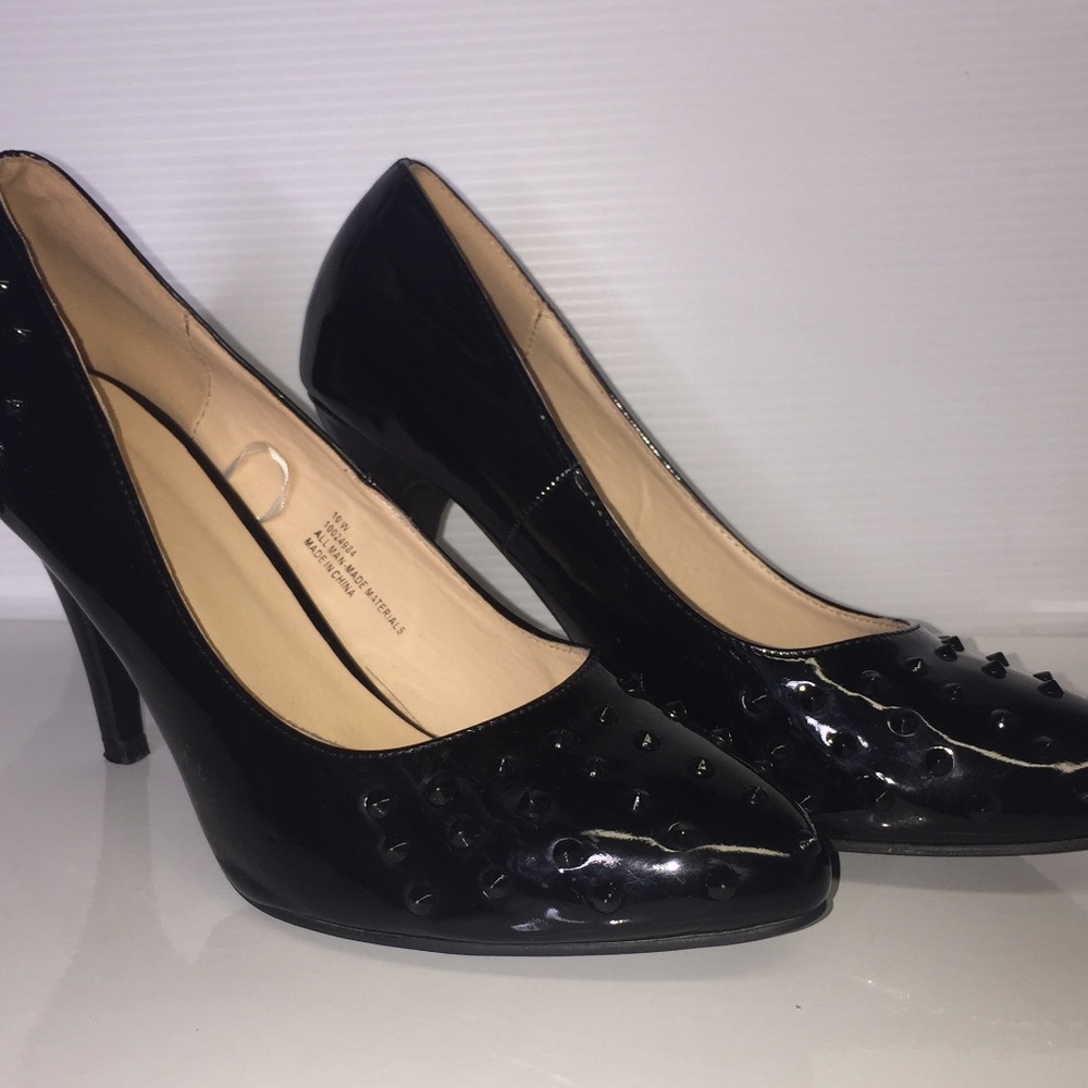 Torrid black heels embellished with spikes.
